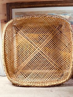 a wicker basket sitting on top of a table