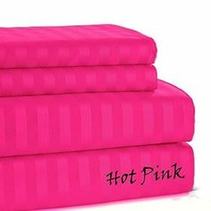 three hot pink towels stacked on top of each other with the word hot pink written across them