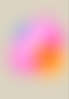 an abstract blurry background in pink and orange