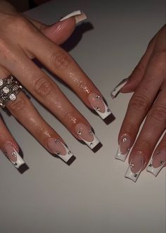 acrylic white nails w/ gems French Tip Nails With Rhinestones Simple, Nail Inspo Coffin With Gems, Half Inch Acrylic Nails, Prom Nail Ideas Square, White Gel Nails With Design Rhinestones, Easy Acrilyc Nails, Birthday Nails Rhinestones Diamonds, Rinstone Nails French Tip, White French Nails With Charms