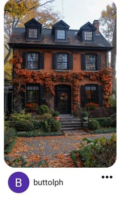 an old house with ivy growing on it's side and the words b in front