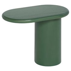 a green table with a wooden top on a white background and an object in the foreground