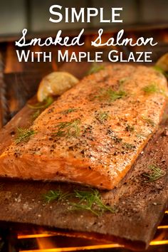 grilled salmon with maple glaze on the grill and text overlay that reads simple smoked salmon with maple glaze