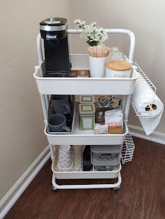 a white cart with some items on top of it