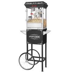 an old fashioned popcorn machine with wheels