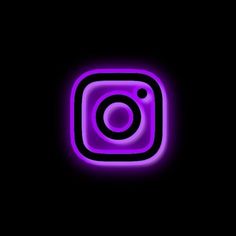 an instagram icon in the dark with purple light on it's side and black background