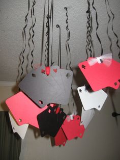 some red and black tags hanging from the ceiling