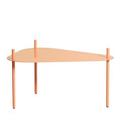 an orange table sitting on top of a white floor next to a metal pipe and wooden legs