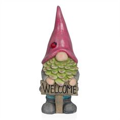 a welcome gnome figurine holding a sign