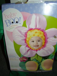 a box that has a baby in a flower on it