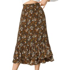 Featuring it's pretty ditsy floral print, this midi skirt is a summery option that can be worn with just about anything. Channel elegant style in this midi skirt, beautifully printed with a blossom print for a versatile look. It is made from lightweight fabric, adds definition to the free-flowing design. Falling to a waterfall midi hem, it sits high on the waist with a discreet side zip fastening. Summer days call for effortlessly feminine styles like the skirt. Beach Cocktail Party, Brunch Picnic, Maxi Skirt Fall, Cottagecore Outfit, Floral Print Skirt, Flowy Skirt, Brown Floral, Chic Woman, Bottom Clothes