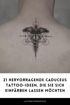 the back of a woman's neck with a caduceus tattoo on it