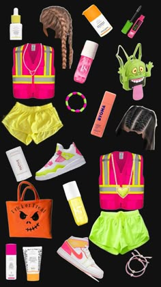 an assortment of clothing and accessories are arranged on a black surface, including a neon vest