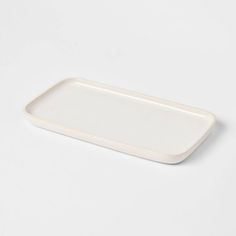 a white rectangular plate on a white background