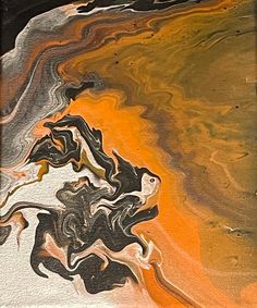 an abstract painting with black, orange and white colors on it's surface is shown