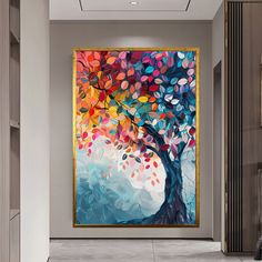 a painting on the wall of a hallway with a large tree in front of it