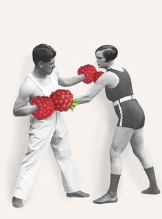 two men are boxing with raspberries on their hands