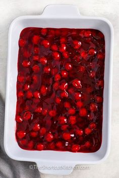 cranberry sauce in a white casserole dish