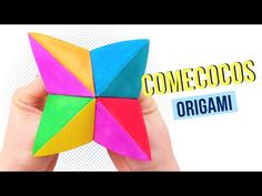 someone holding an origami star in their hand with the words comecoos on it