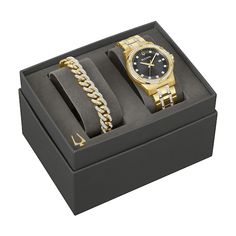 From the Bulova men’s Crystal Collection, this exclusively-ours boxed set exudes glamorous confidence. Gold-tone stainless steel case set with sparkling crystals So sleek, the black dial is appointed with a gold-tone handset, 11 crystal hour markers, date display, and flat mineral crystal The gold-tone stainless steel watch bracelet features sharp, dramatic faceting and brushed and polished finishes Bold gold-tone Cuban curb bracelet set with 260 crystals with a tuning fork clasp Boxed and ready Capsule Jewelry, Guy Gifts, Curb Bracelet, Tuning Fork, Bday Gift, Bracelet Box, Watch Bracelet, Boxed Set, Sparkling Crystal