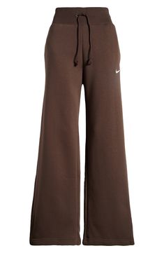 Get incredibly comfy in these wide-leg sweats cut from cozy brushed fleece and finished with split hems so you can show off your favorite footwear. 31" inseam; 23" leg opening; 13 1/2" front rise; 17 1/2" back rise (size Medium) 31 1/2" inseam; 24" leg opening; 14 1/2" front rise; 19" back rise (size 2X) Drawstring waist Side-seam pockets 80% cotton, 20% polyester Machine wash, tumble dry Imported Cute Nike Hoodies For Teenagers, High Waist Sweatpants, Breathable Pants Women, Outfits For Size 6 Women Style, Womens Clothes Aesthetic, Cute Trendy Pants, Trendy Clothing Pieces, Lulu Groove Pant Outfit, School Clothes Essentials