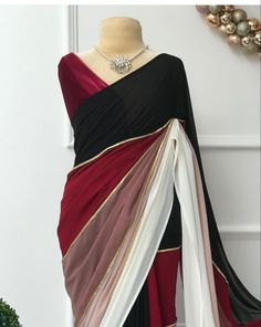 Package Contains: Saree, Blouse, Petticoat Fabric: Original Soft Georgette with digital print  (5.5 m)  Work: - beautiful colors digital print with lace in saree    Blouse: - Satin silk (0.80 m) With FREE Saree fall and Pico with matching petticoat. Our Services- Stitching service is also available on customer demand. Please get in touch with us for Stitching Service. We customize everything when it comes to ethnic wear. We Provide both i.e. unstitched and stitched blouse as required, so feel fr Elegant Multicolor Draped Dress, Elegant White Draped Saree, Elegant Red Draped Blouse Piece, White Traditional Drape Blouse For Formal Occasions, Elegant Red Blouse Piece For Evening, Elegant Red Blouse For Evening, Elegant Red Evening Blouse Piece, Fitted Chiffon Blouse With Traditional Drape, Elegant Draped Blouse Piece For Formal Occasions