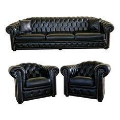 two black leather couches and one chair