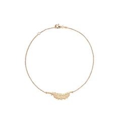 a gold bracelet with leaves on it