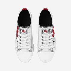 Low tops. High spirits. No matter the final score, you'll always be winning with the Kansas City Chiefs Women's Big Logo Low Top White Canvas Shoes on your feet. Features All-over white design so you can rep the team in style Team logo displays on tongues, in case there were any doubts where your allegiances lie Bold team logo displays on outer sides for a little extra team spirit Team-colored stripe accents on midsoles and heels for added fan fashion Adjustable laces for security Closed, round White Sneakers With Logo Print For Sports, Collegiate White Basketball Shoes With Boost Midsole, Graphic Print Skate Shoes With Round Toe, Mid-top High-top Sneakers With Logo Print For Sports, White High-top Sneakers With Graphic Print, White High-top Sporty Custom Sneakers, White Sporty High-top Custom Sneakers, Casual White Mid-top Custom Sneakers, Collegiate White Low-top Sneakers