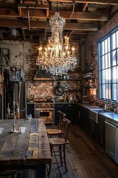 an old fashioned kitchen with wood floors and brick walls, chandelier hanging from the ceiling