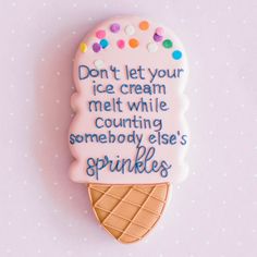 a decorated ice cream cone with the words don't let your ice cream melt while counting somebody else's sprinkles