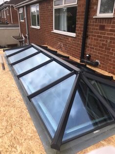 an image of a roof that is being installed on the side of a house in england