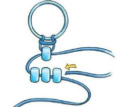 an image of a keychain that is attached to a cord and has two keys on it