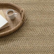 there is a coffee table with two cups and papers on it, along with other items