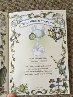 the book is opened to show an image of a cocktail