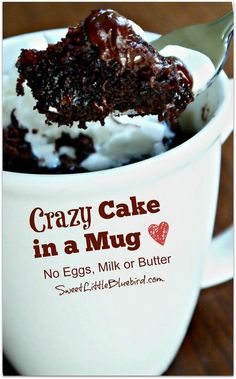 there is a cup with cake in it and ice cream on the side that says crazy cake in a mug no eggs, milk or butter