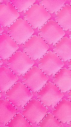 pink leather texture with stitching and diamond pattern for background or wallpaper stock photo