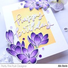 a happy birthday card with purple flowers on it