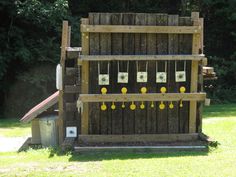 a wooden structure with several pieces of wood attached to it