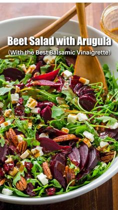 beet salad with arugula and feta cheese in a white bowl on a wooden table