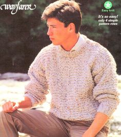 a man sitting on top of a rock wearing a sweater and pants with the words patons