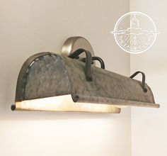 an old fashioned light fixture in a room