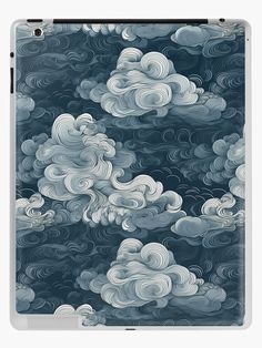 an ipad case with clouds in the sky