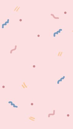 an abstract pink background with blue and yellow confetti on the bottom right corner