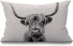 a black and white photo of a cow's head on a pillow cover with the words, i love you