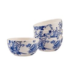 three blue and white bowls sitting next to each other