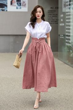 "DETAIL * 100% linen * No lining * Pleated around waist * Two side seam pockets * Front drawstring  skirt * Back zipper closure * Mid calf length * Perfect for spring and summer, autumn * Wash by hand or machine with cold water * The model is 170cm (5′7″) tall with a 80cm (31.5\") bust, 66cm (26\") waist. She is wearing the green skirt in size XS * Choose CUSTOM Order if you Can't find your size in our size Chart Chang the Length Your Height is not Between 5'1\" - 5\"9\" Your weight is not Between 45kg - 75kg Choose CUSTOM Order if you * Can't find your size in our size Chart * Change the Length * Change the sleeve length * Your Height is not Between 5'1\" - 5\"9\" * Your weight is not Between 47 kg - 75kg SIZE GUIDE Size vary between Brand and Country Please get your body measurement with Long Linen Skirt, Drawstring Skirt, Skirt Tulle, Long Skirt Outfits, Rock Outfit, Linen Skirt, Pink Skirt, Mode Inspo, Green Skirt