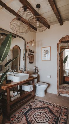 a bathroom with two sinks and a large rug