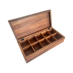 an open wooden box with compartments on the inside