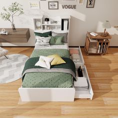 a bed sitting on top of a wooden floor next to a white dresser with drawers